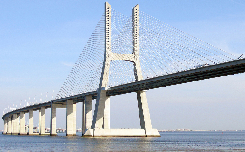 The Vasco da Gama Bridge, Lisbon Portugal. This bridge is an apt metaphor for the meticulous workmanship you will find at Proof Positive Inc, Creative Services in print and online. Graphic Design. web sites, web sites, New York, printing, typography, photography, illustration, charts, graphs, annual reports, brochures